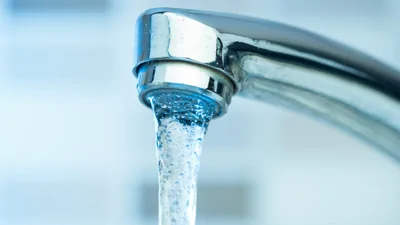 Image shows water running from tap