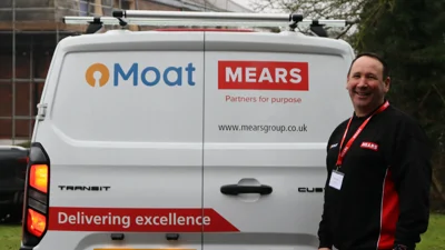 Mears operative stands at back of Moat van