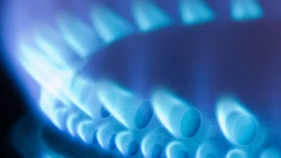 Image shows blue gas flame from stove