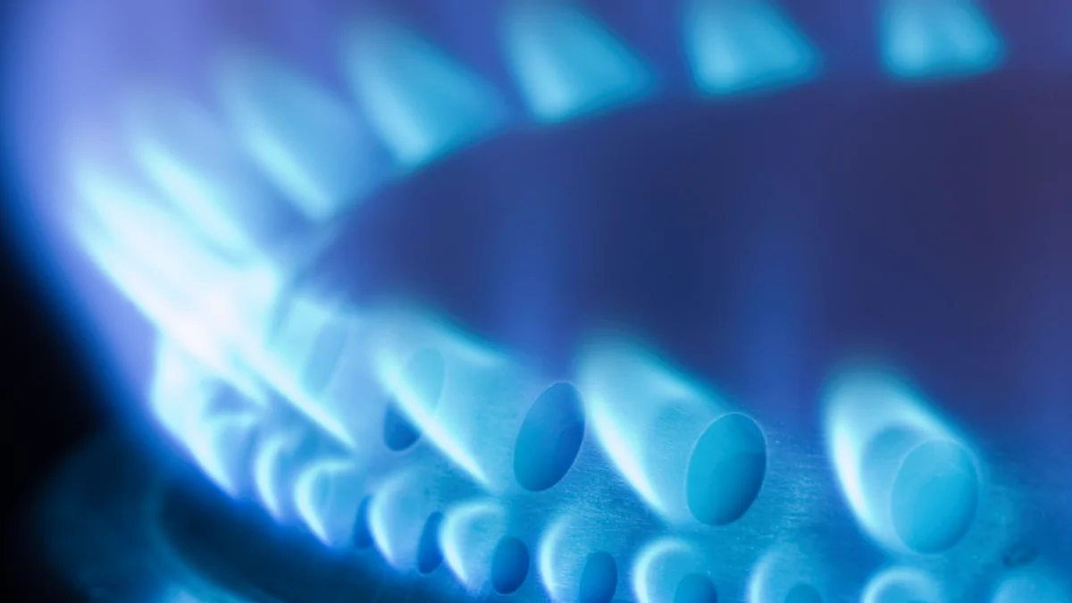 Image shows blue gas flame from stove