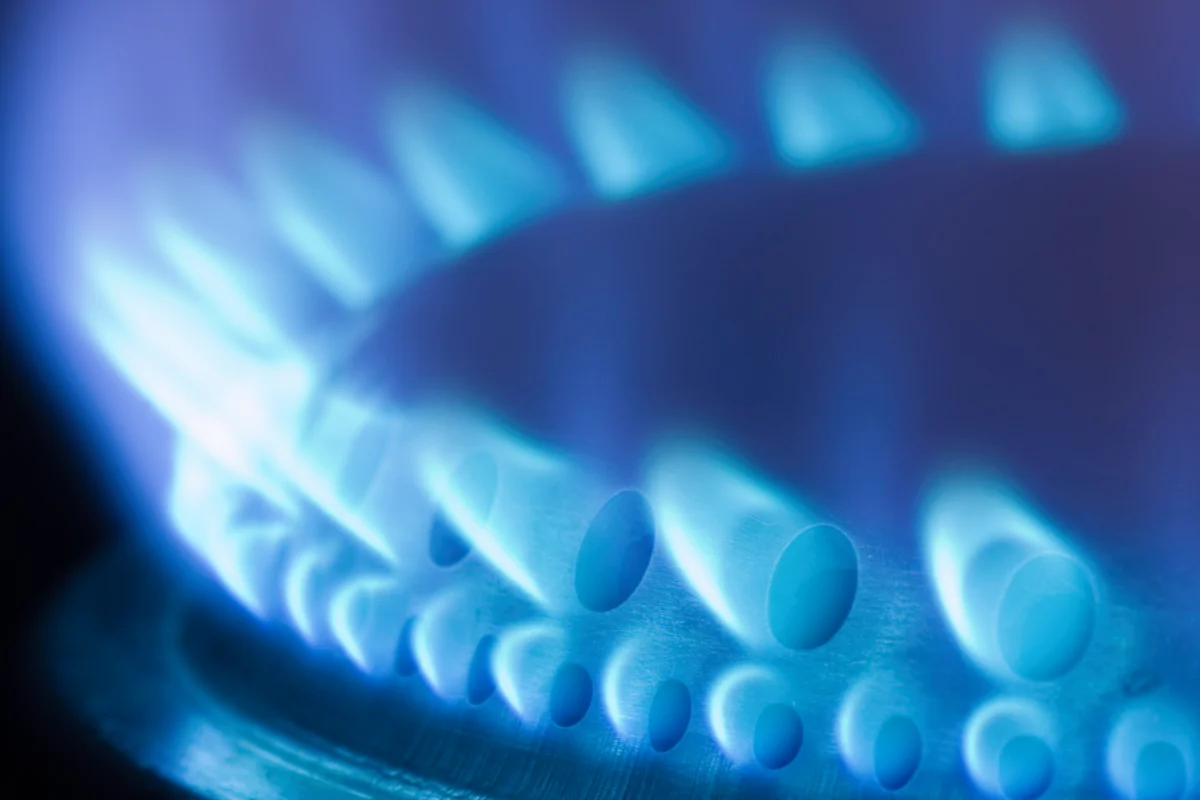 Image shows blue gas flame from stove