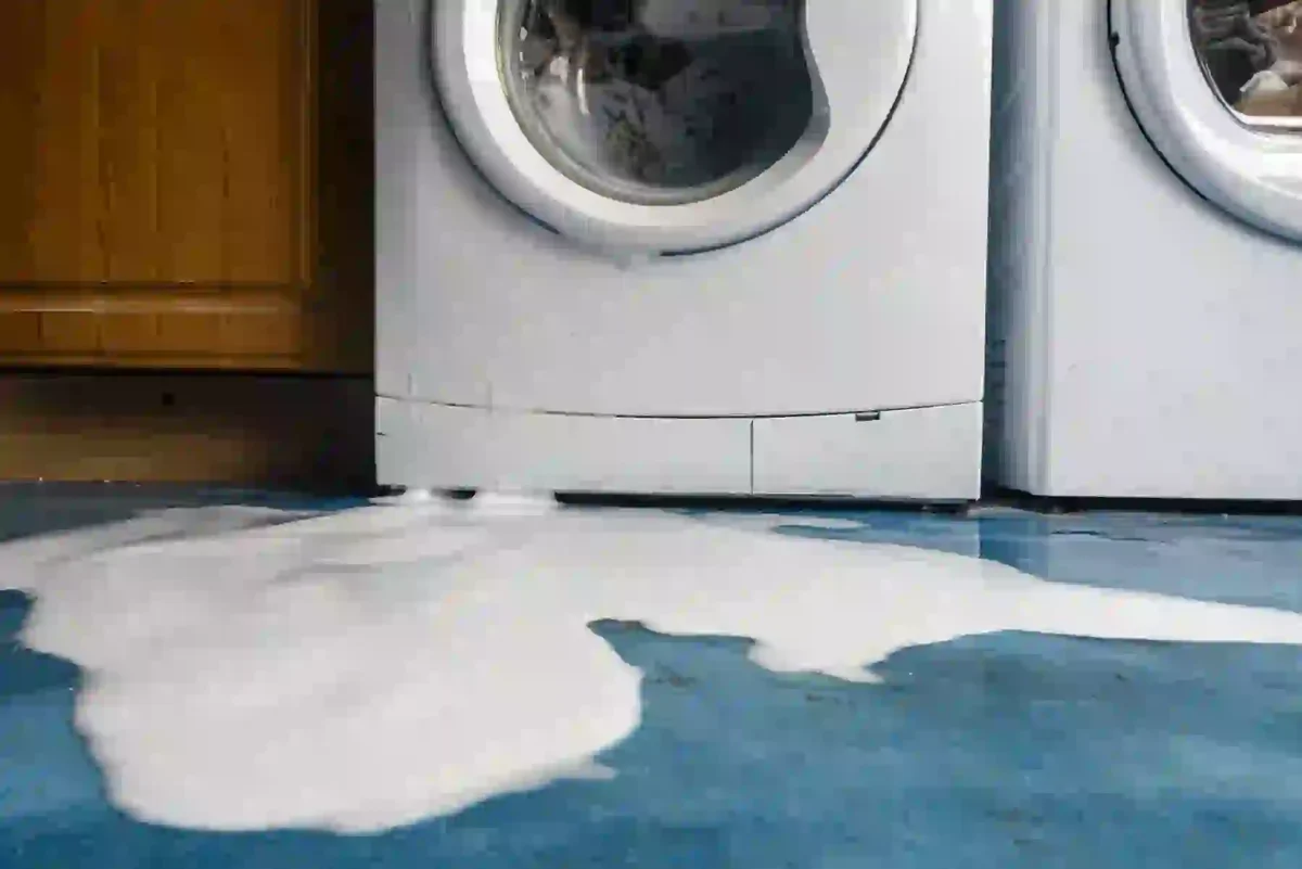 Washing machine has leaked soapy water on floor