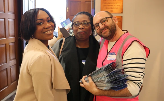 Moat colleagues smiling at staff conference